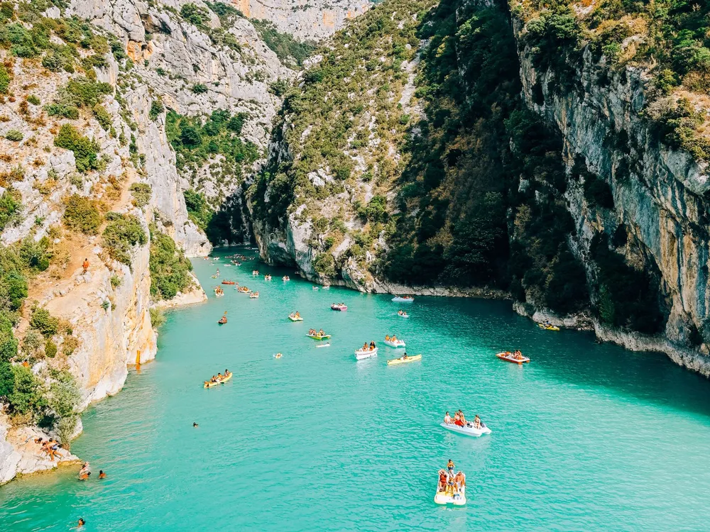 High-angle view of the Verdon Gorges and its turquoise river between high limestone cliffs